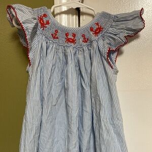 Petit Bebe smocked crab dress